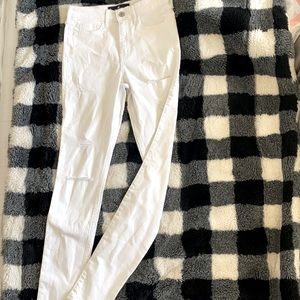 White skinny jeans with rips